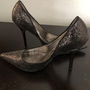 Sequined black pumps.